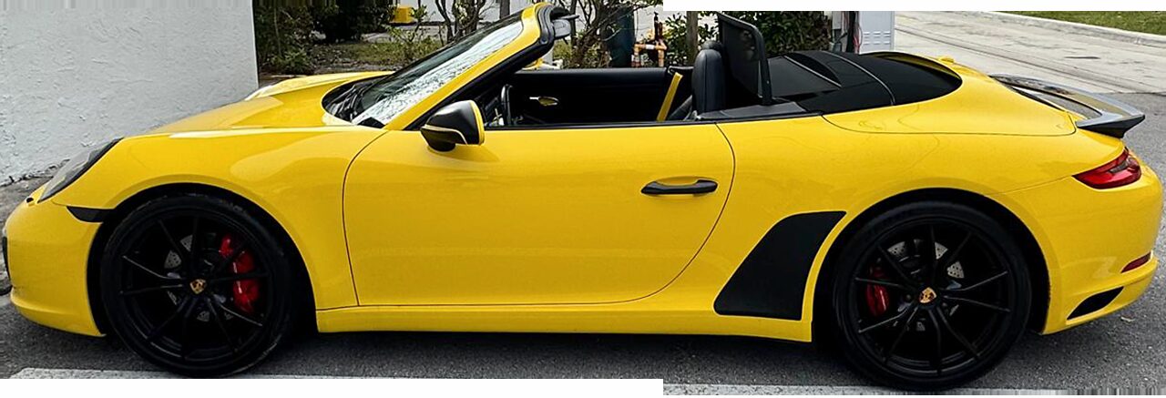 Porsche 911S Cabriolet, yellow with black soft top