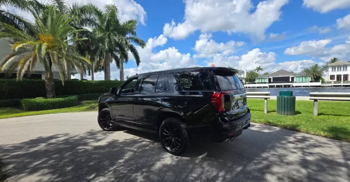 2021 GMC Yukon Denali, rear three-quarter view